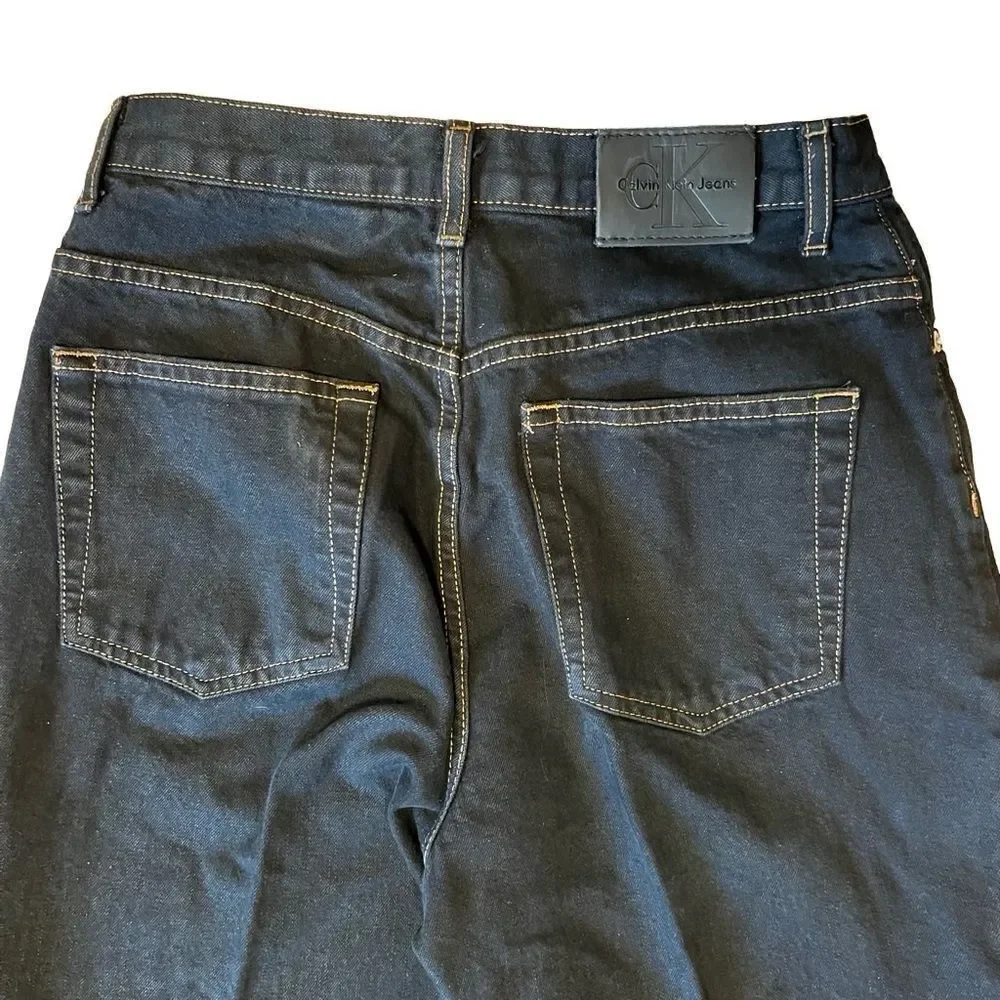 Calvin Klein Black Five Pocket Jeans. Size 6. 32 inch inseam. Great Condition!!